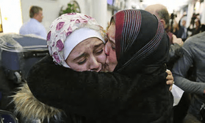 Trump travel ban hits major setback after judges uphold temporary restraining order